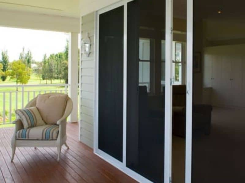 A balcony of security screen mesh doors, professionally fitted by Macarthur Home Improvements in Campbelltown